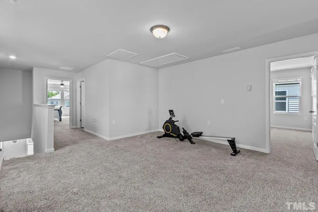 a view of a workspace with furniture