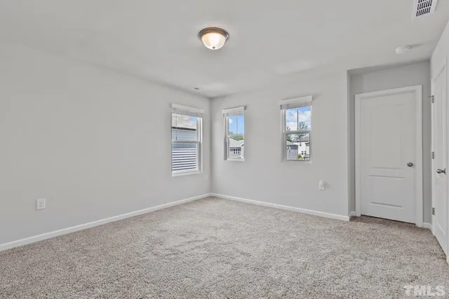 a kitchen with stainless steel appliances granite countertop a lot of counter space and wooden floor