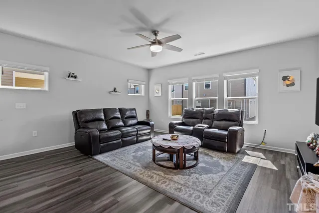 a kitchen with stainless steel appliances granite countertop a sink and stove