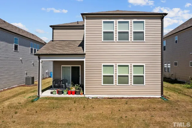 a swimming pool with a yard