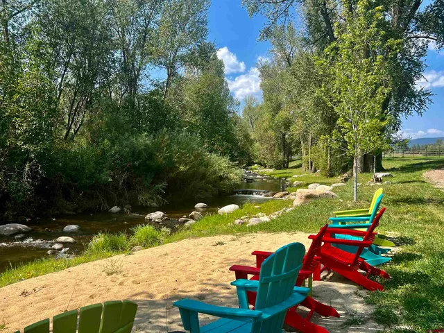 a view of a yard with an outdoor space