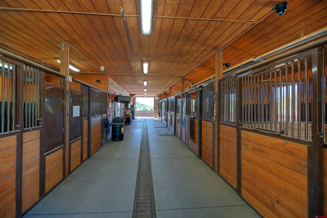 a view of a porch with wooden floor
