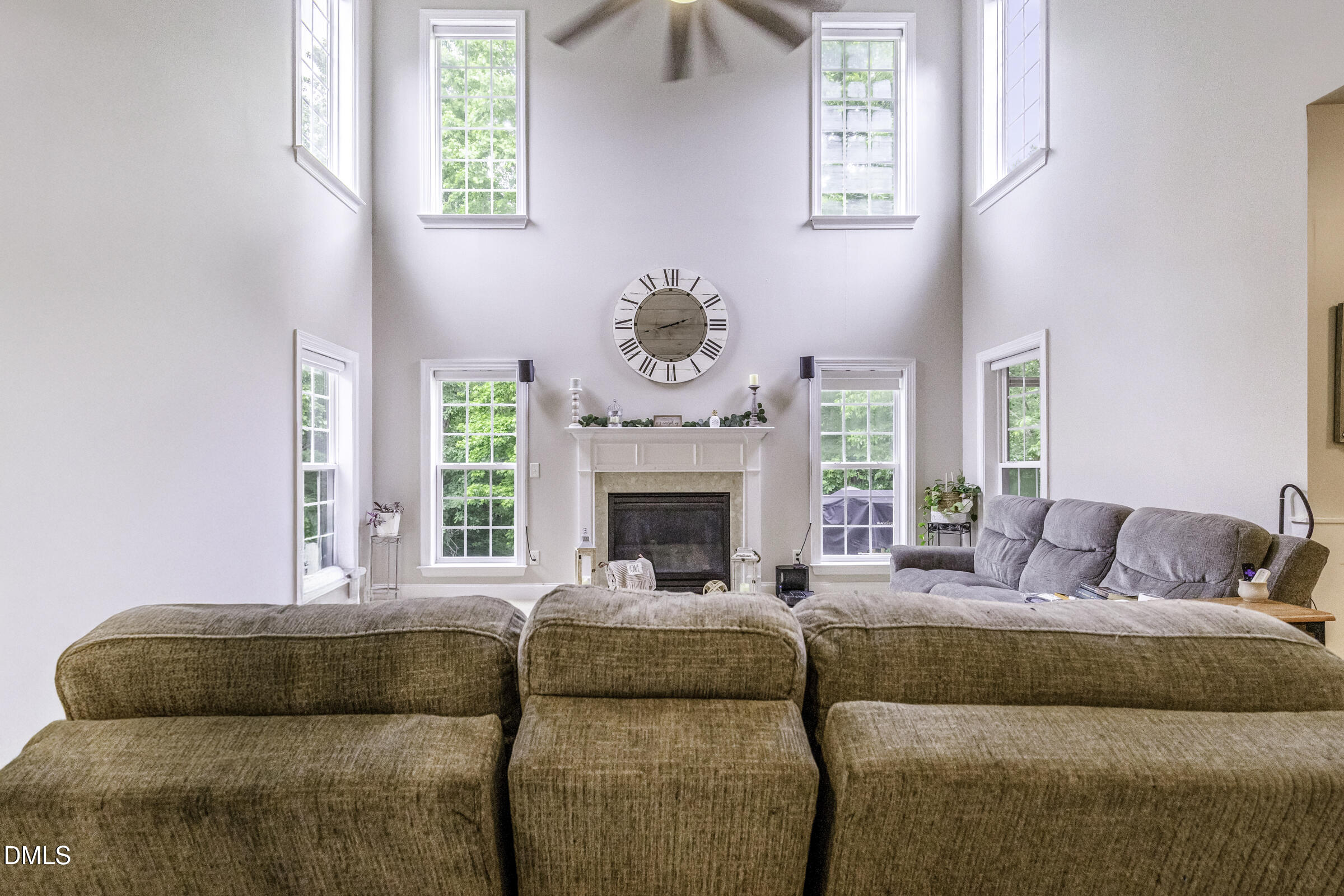 201 Quarryrock Road Holly Springs, NC 27540 - Photo 11 of 34 a living room with furniture fireplace and window