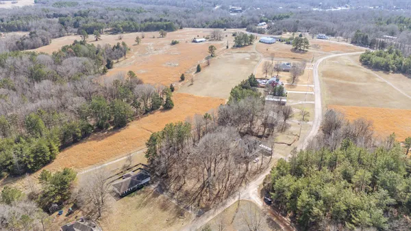 a view of a yard with a lake