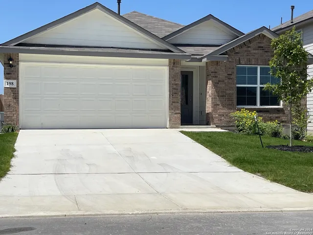 a front view of house with yard