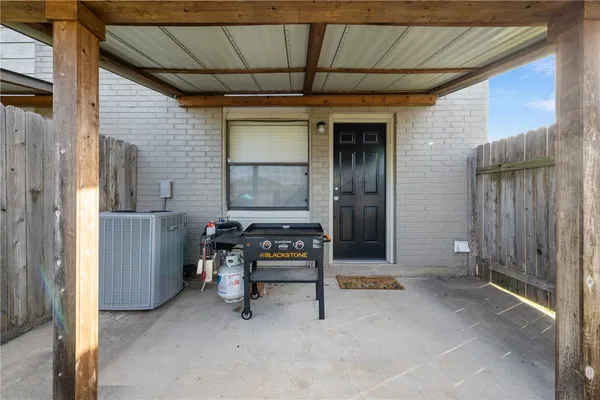 a view of backyard with cabin