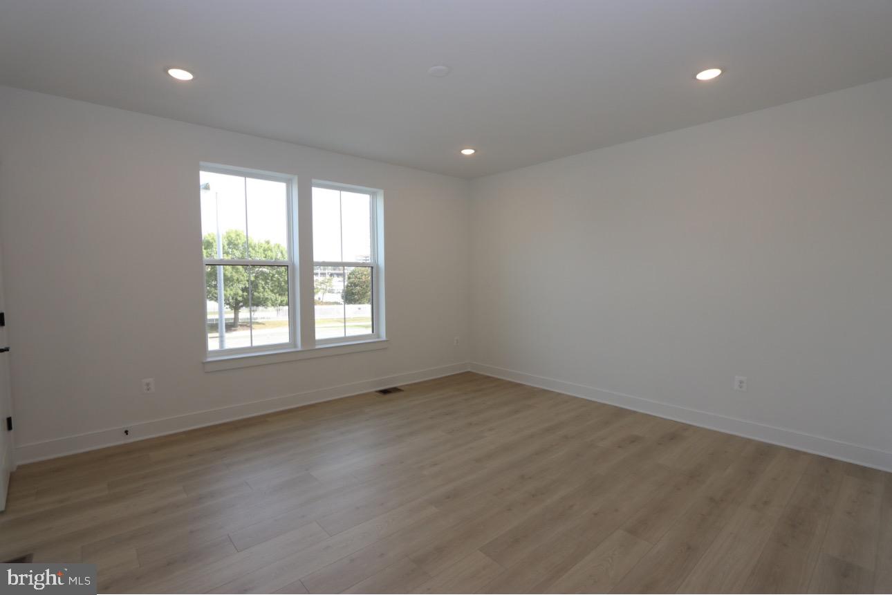 117 East Cromwell Street, Unit A Baltimore, MD 21230 - Photo 11 of 35 an empty room with a window