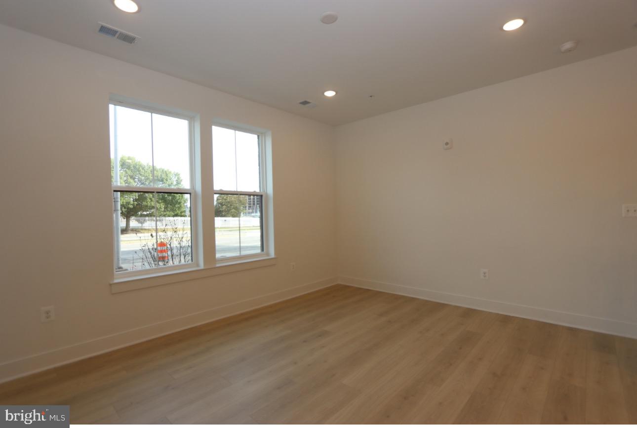 117 East Cromwell Street, Unit A Baltimore, MD 21230 - Photo 20 of 35 a view of an empty room with a window