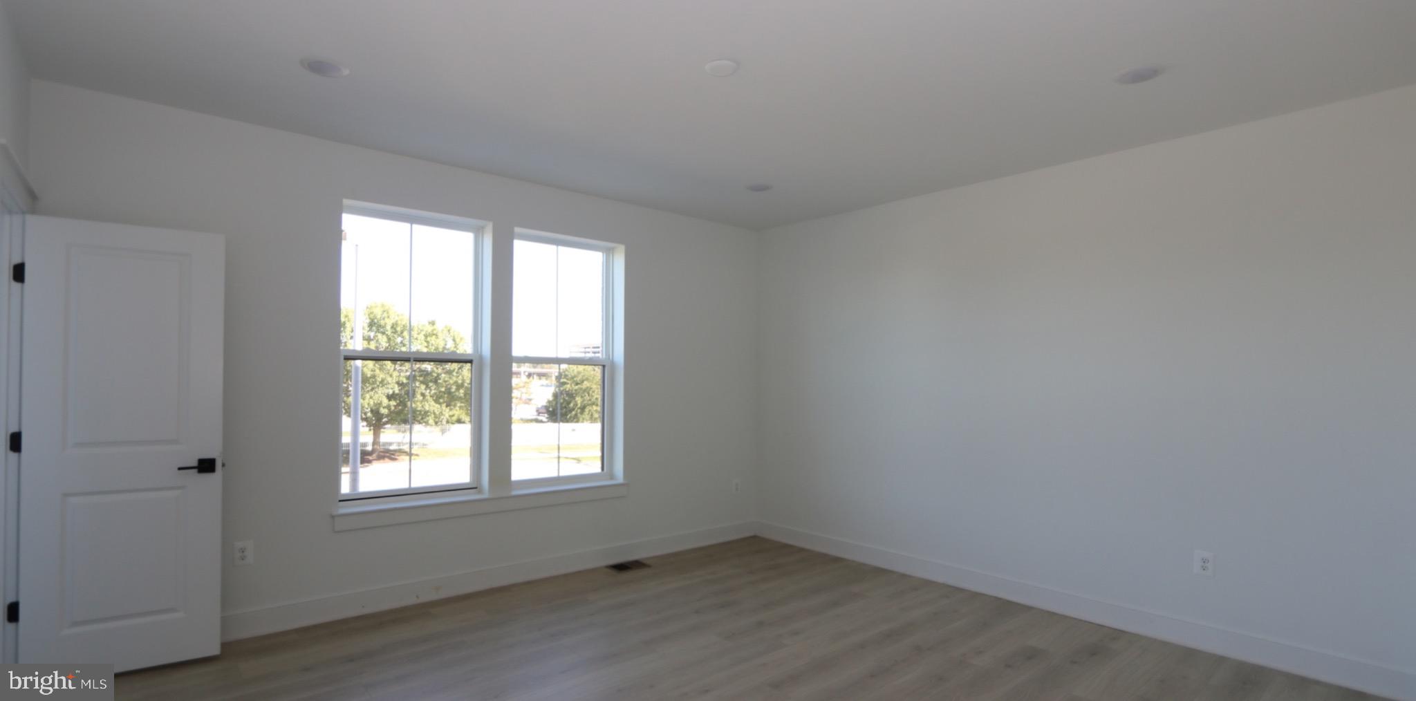 117 East Cromwell Street, Unit A Baltimore, MD 21230 - Photo 27 of 35 an empty room with a window