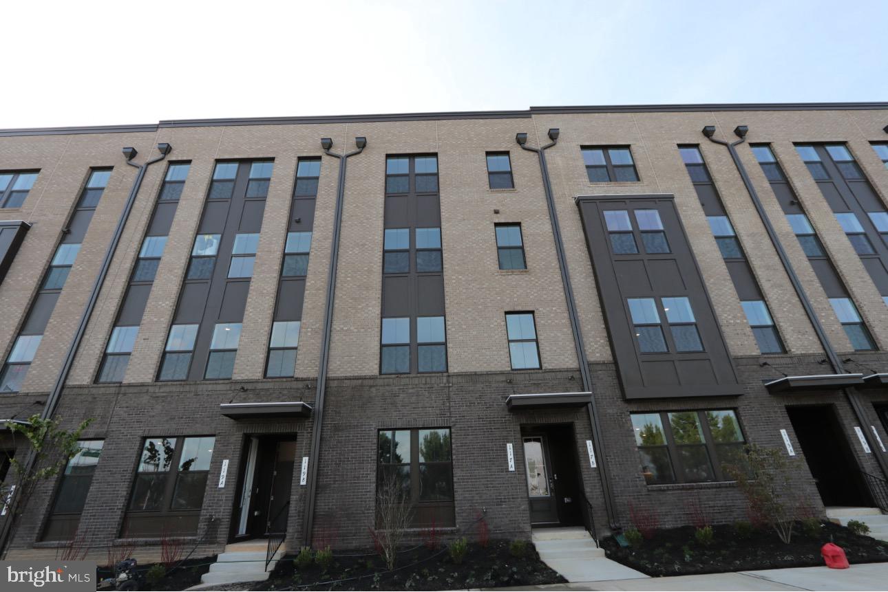 117 East Cromwell Street, Unit A Baltimore, MD 21230 - Photo 8 of 35 a front view of a building with glass windows