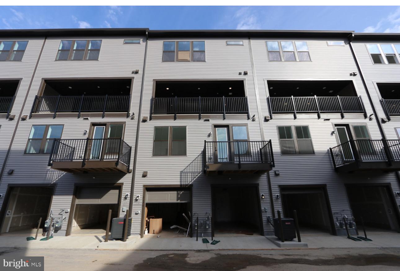 117 East Cromwell Street, Unit A Baltimore, MD 21230 - Photo 10 of 35 a front view of a building with parking space