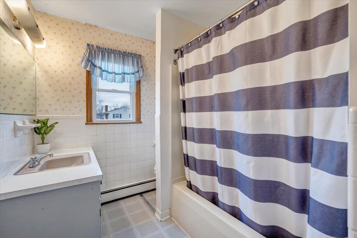 626 Santee Road Roanoke, VA 24019 - Photo 24 of 56 a bathroom with a sink and mirror