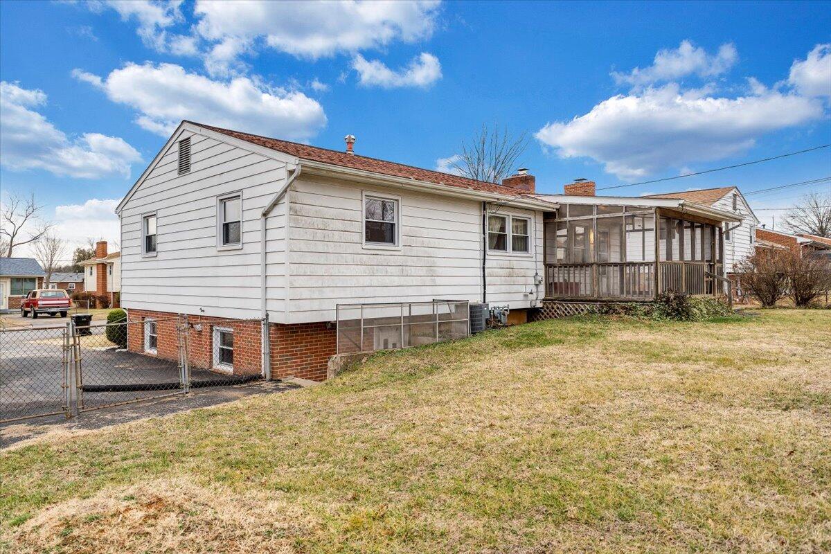 626 Santee Road Roanoke, VA 24019 - Photo 41 of 56 a view of a house with a yard and wooden fence