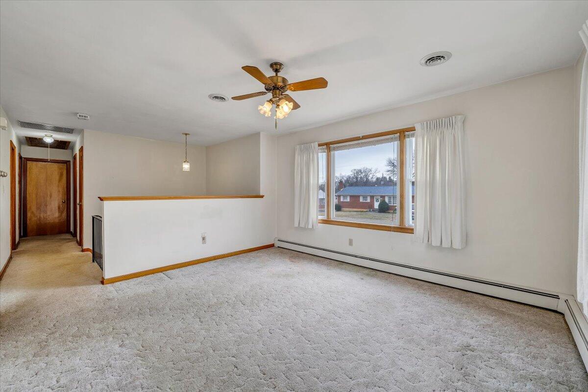 626 Santee Road Roanoke, VA 24019 - Photo 5 of 56 a view of an empty room with a window