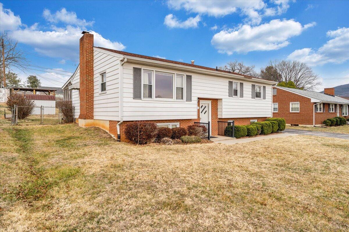 626 Santee Road Roanoke, VA 24019 - Photo 51 of 56 a front view of a house with a yard