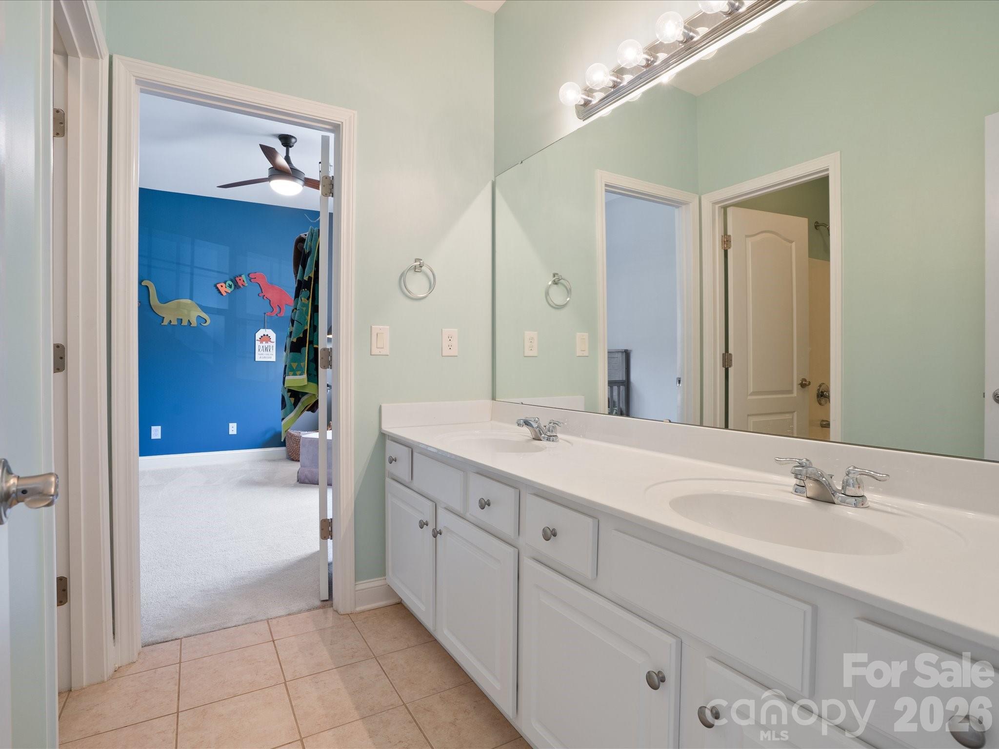 567 Quicksilver Trail Fort Mill, SC 29708 - Photo 19 of 37 a spacious bathroom with a bathtub sink and mirror