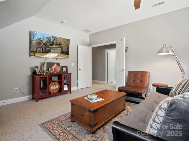 a living room with furniture and a couch