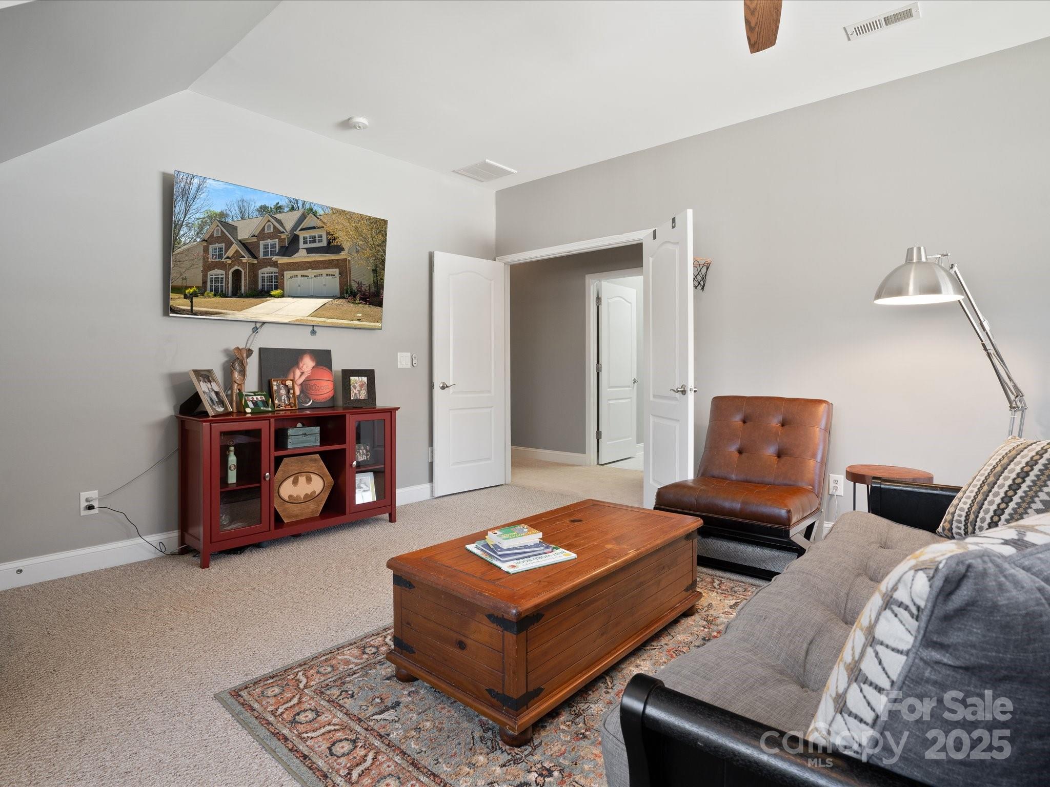 567 Quicksilver Trail Fort Mill, SC 29708 - Photo 27 of 37 a living room with furniture and a couch