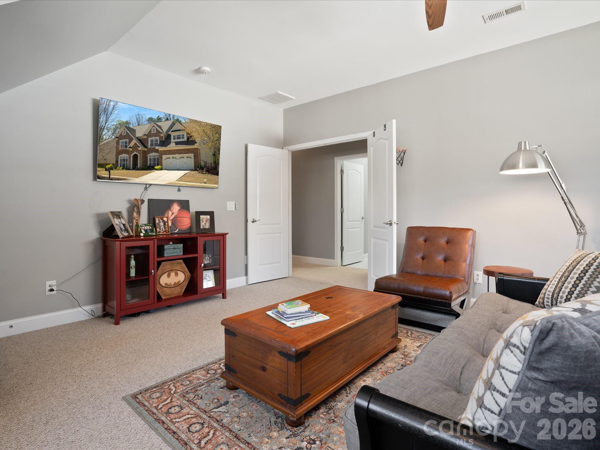 567 Quicksilver Trail Fort Mill, SC 29708 - Photo 29 of 37 a living room with furniture and a couch