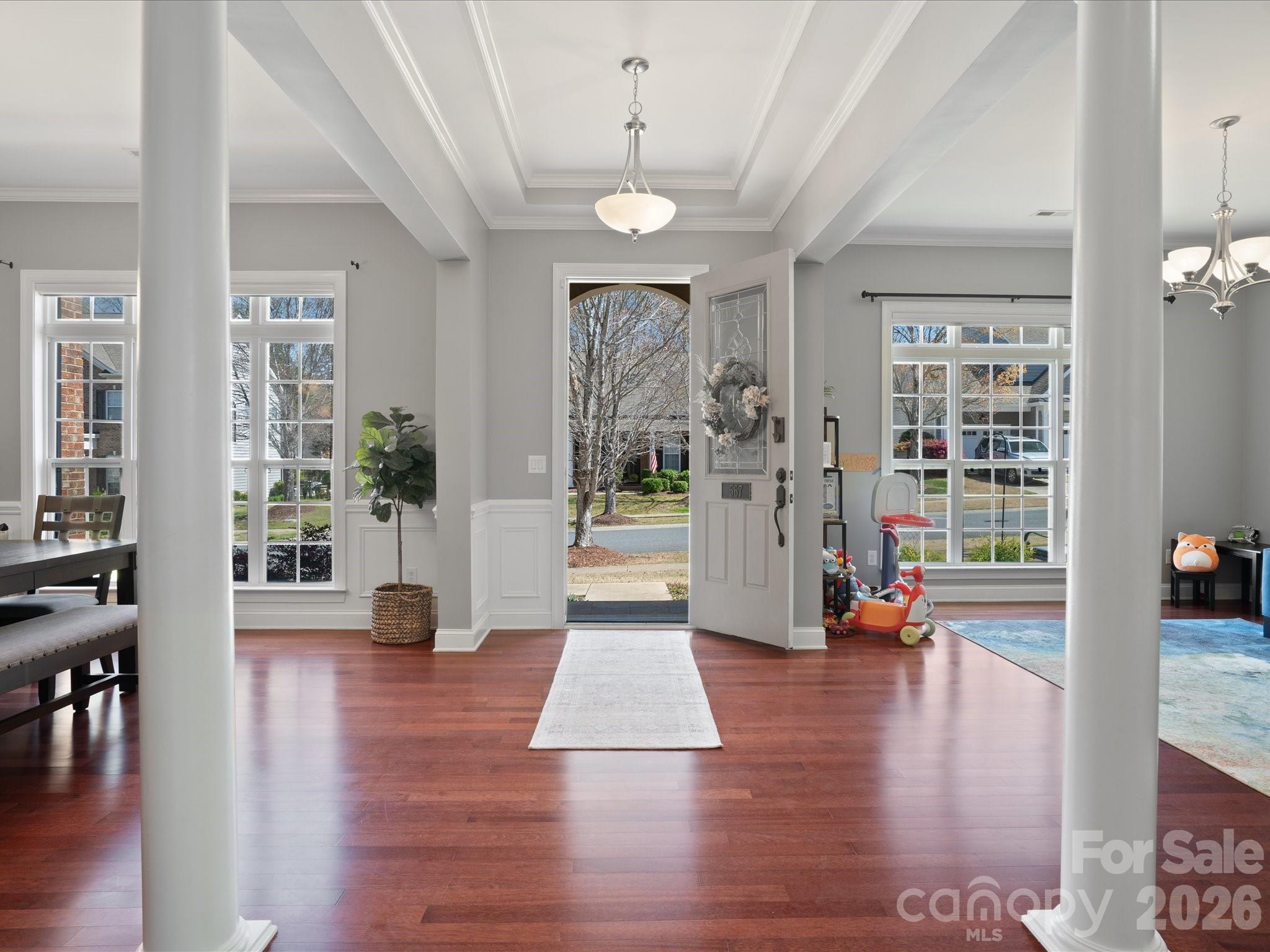 567 Quicksilver Trail Fort Mill, SC 29708 - Photo 10 of 37 a view of an entryway and livingroom with furniture