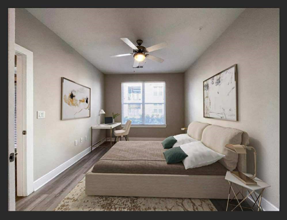 4000 Anserra Trail, Unit AH Katy, TX 77494 - Photo 7 of 10 a living room with furniture and a window