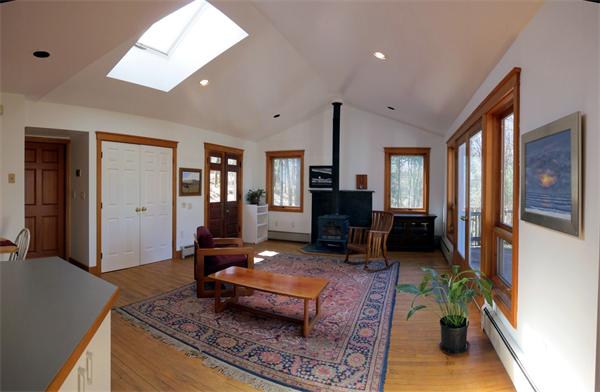 137 Baker Hill Road Northampton, MA 01062 - Photo 3 of 21 a living room with furniture fireplace and rug