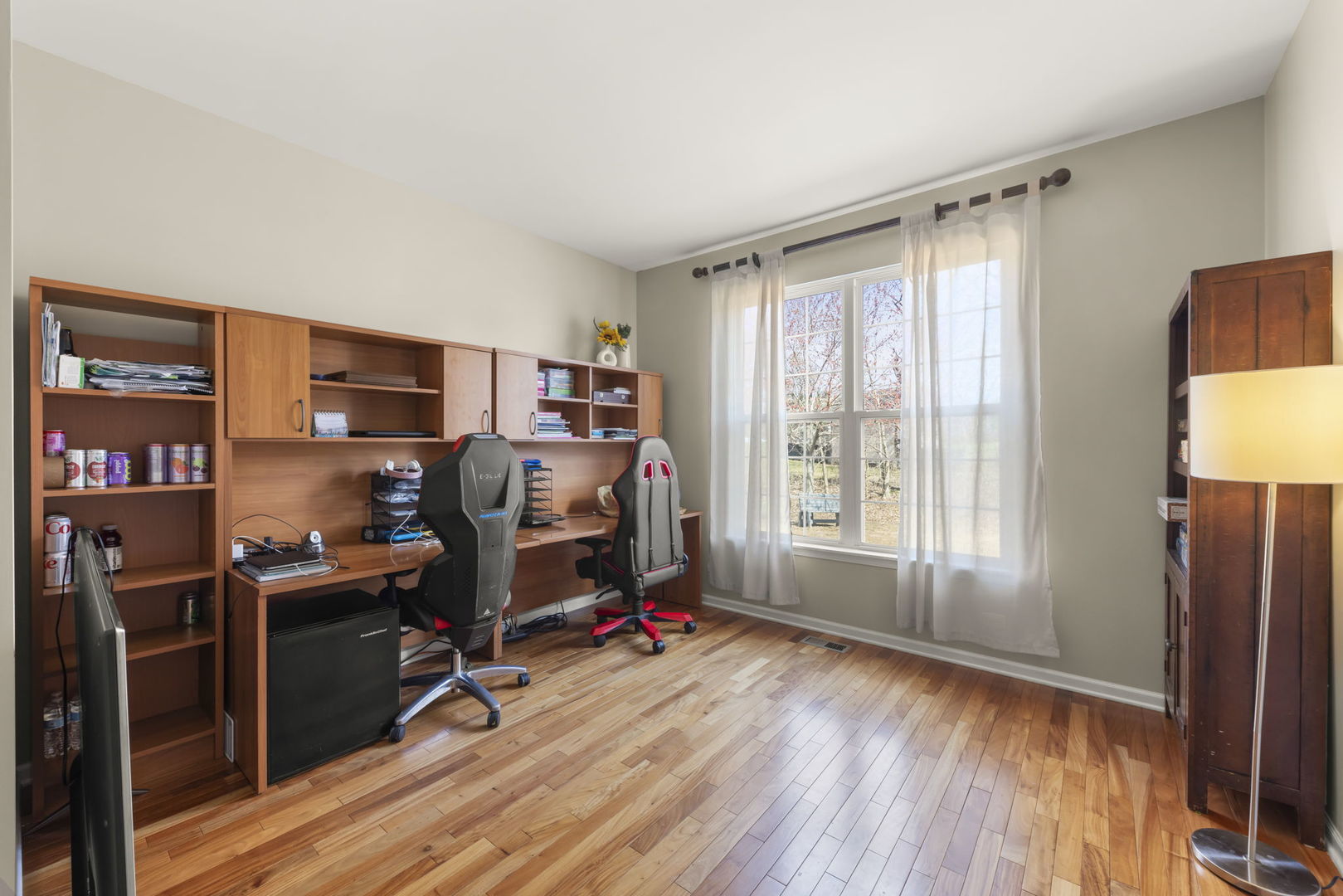 1934 Raintree Road Yorkville, IL 60560 - Photo 12 of 40 a view of a workspace with furniture and a window