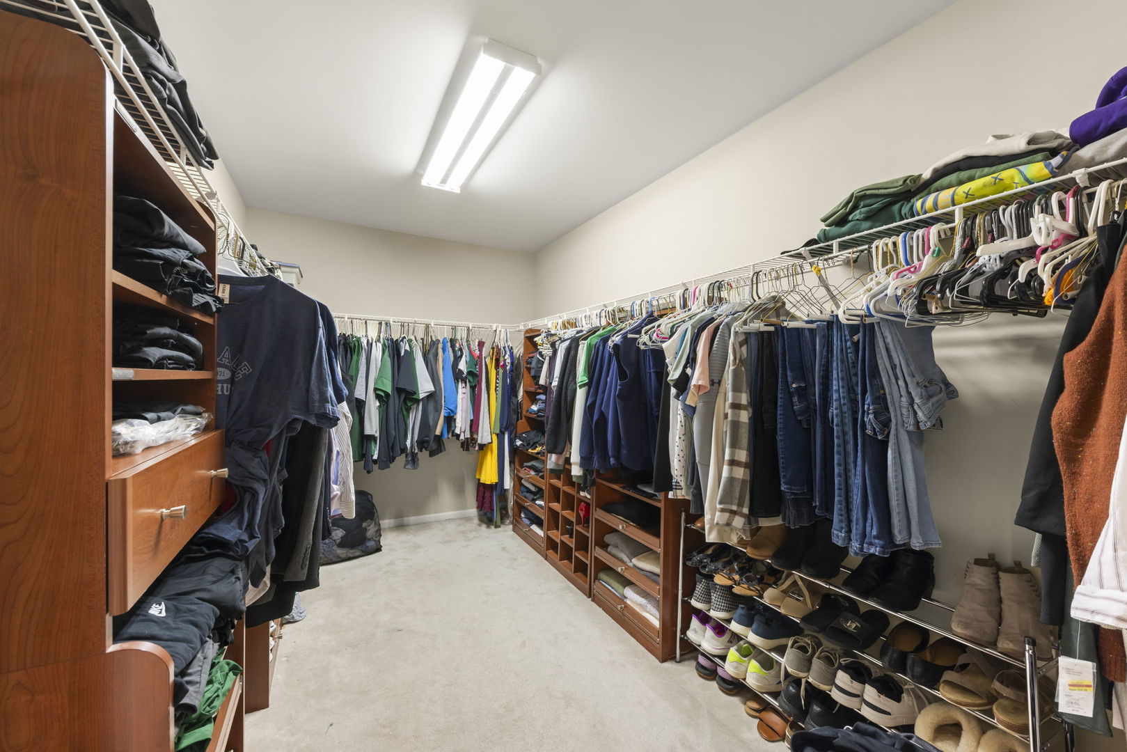 1934 Raintree Road Yorkville, IL 60560 - Photo 20 of 40 a view of walk in closet with clothes and shoes
