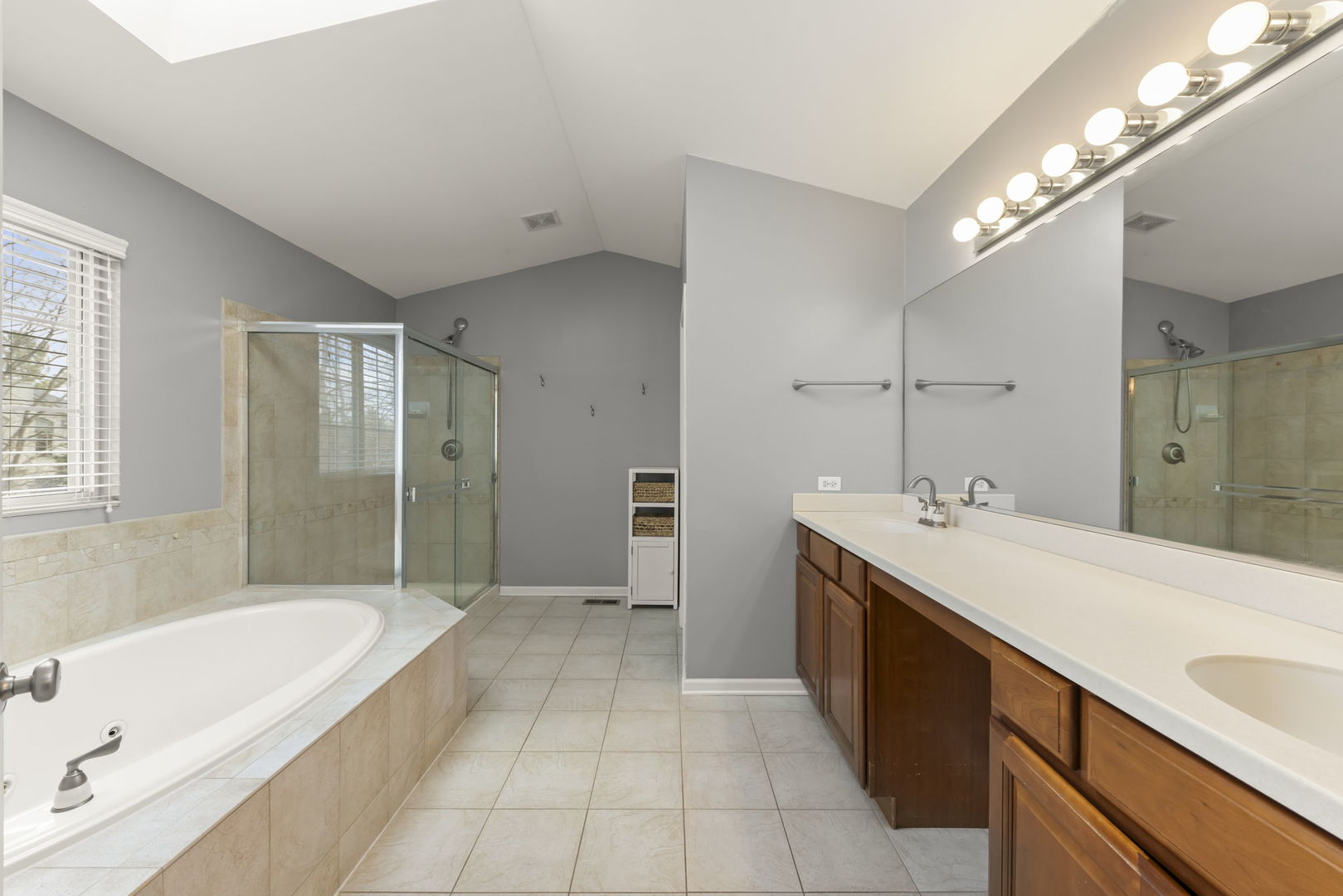 1934 Raintree Road Yorkville, IL 60560 - Photo 21 of 40 a spacious bathroom with a tub sink shower and mirror