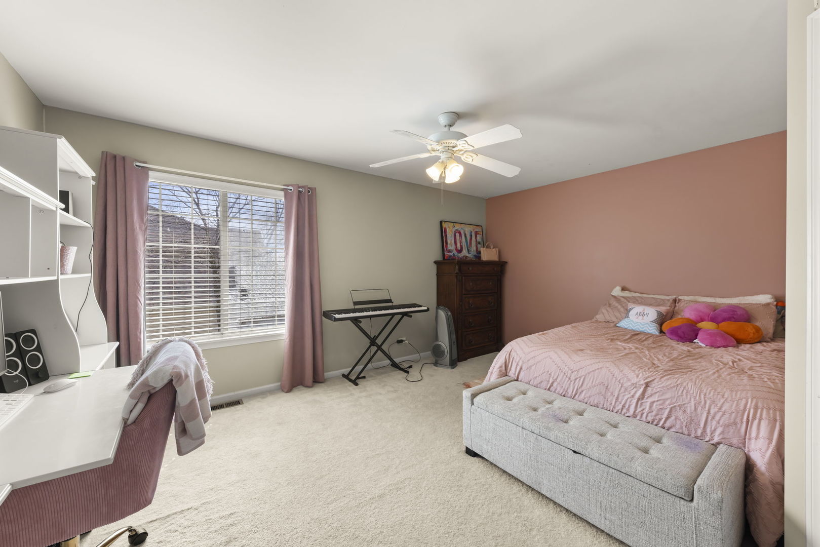 1934 Raintree Road Yorkville, IL 60560 - Photo 23 of 40 a bedroom with a bed couch and a window