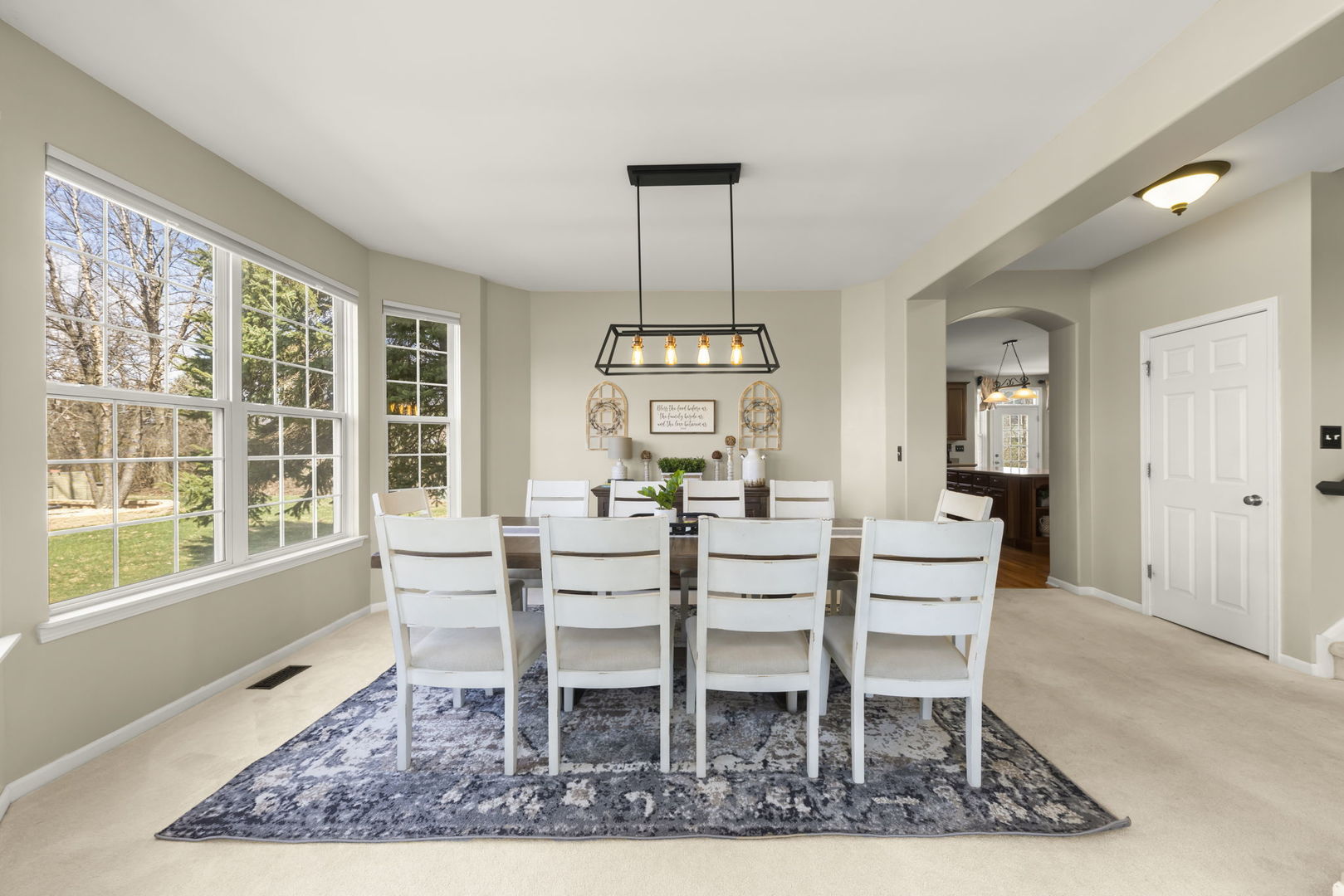 1934 Raintree Road Yorkville, IL 60560 - Photo 5 of 40 a dining room with wooden floor and window