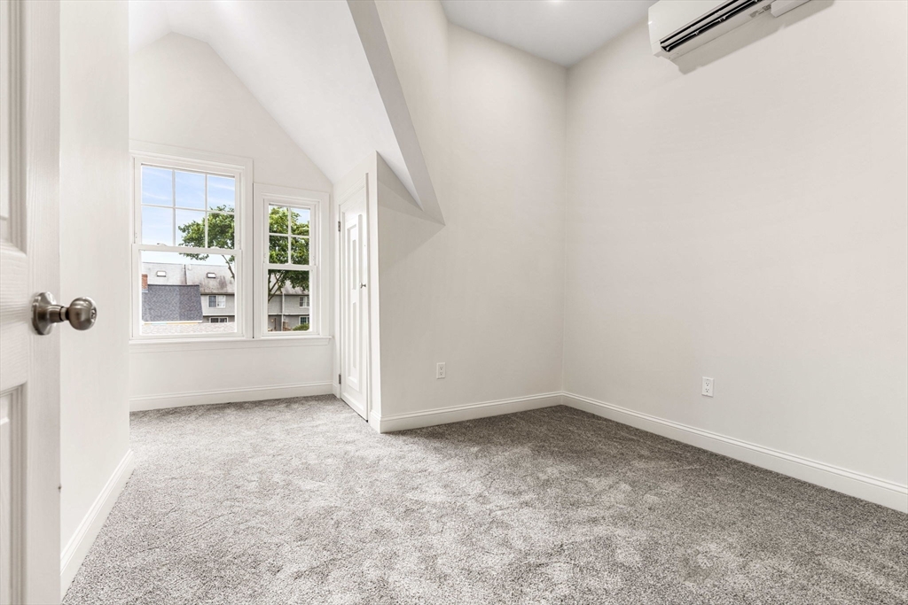 1280 Middlesex Street Lowell, MA 01851 - Photo 15 of 35 an empty room with windows