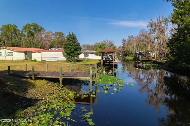 a view of a lake with a house