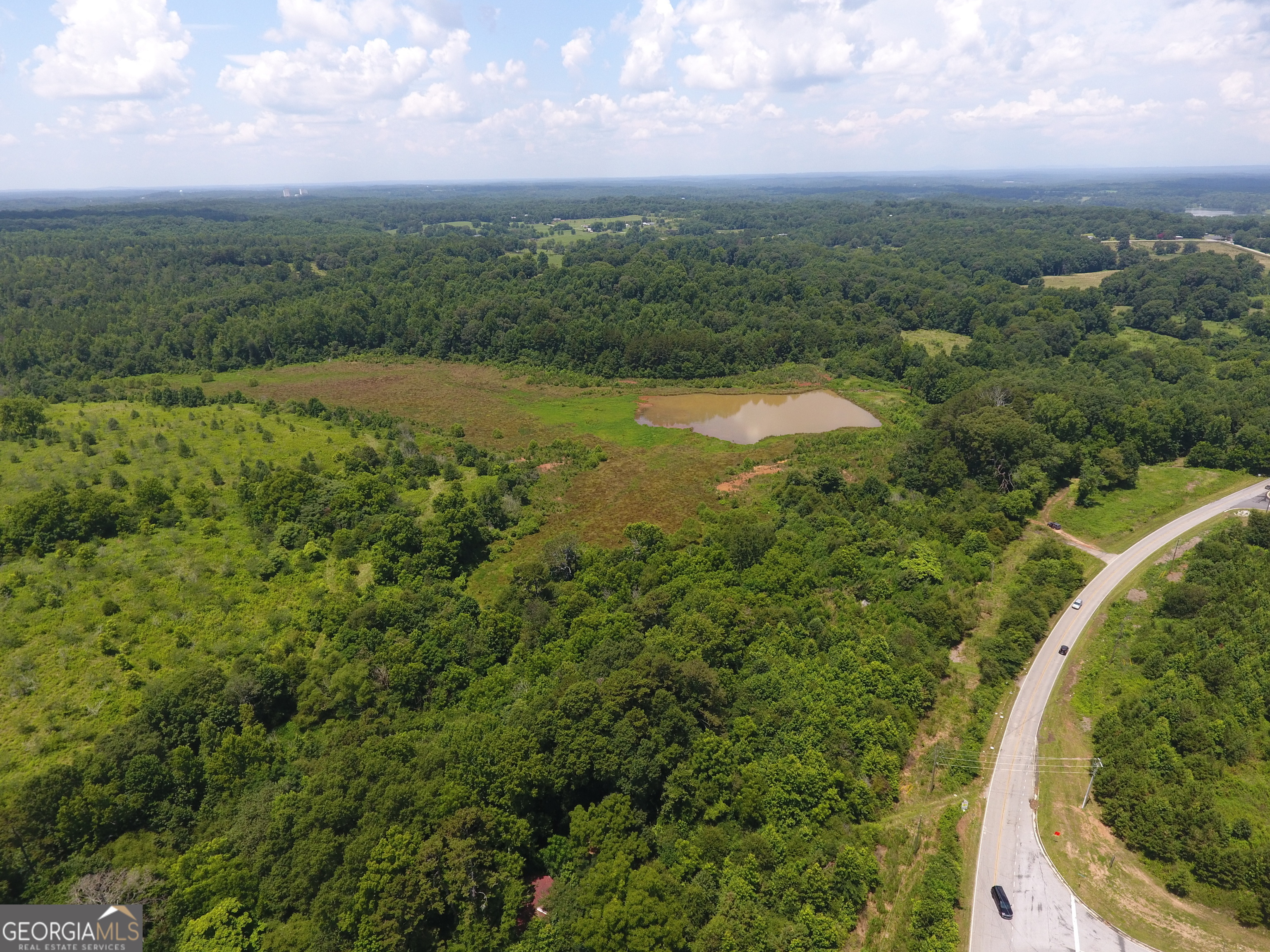 1911 Ridgeway Church Road Commerce, GA 30529 - Photo 6 of 13 an aerial view of residential houses with outdoor space and trees