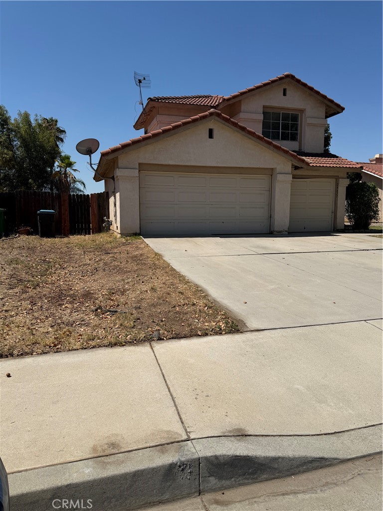 24677 Rugby Lane Moreno Valley, CA 92551 - Photo 3 of 43 Side of house - view from street. Potential for RV parking.