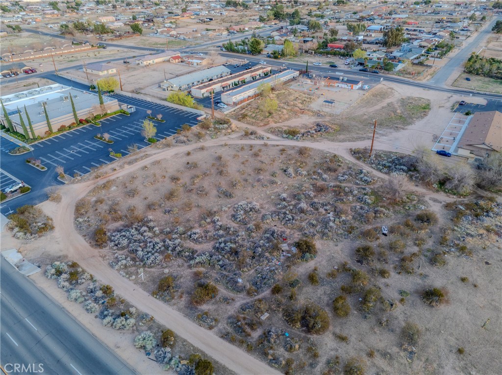 16401 Bear Valley Road Hesperia, CA 92345 - Photo 4 of 8 a view of a backyard of a house