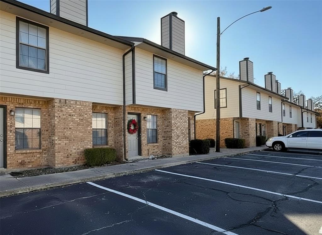 1237 Dallas Drive Denton, TX 76205 - Photo 14 of 18 a view of a building with a street