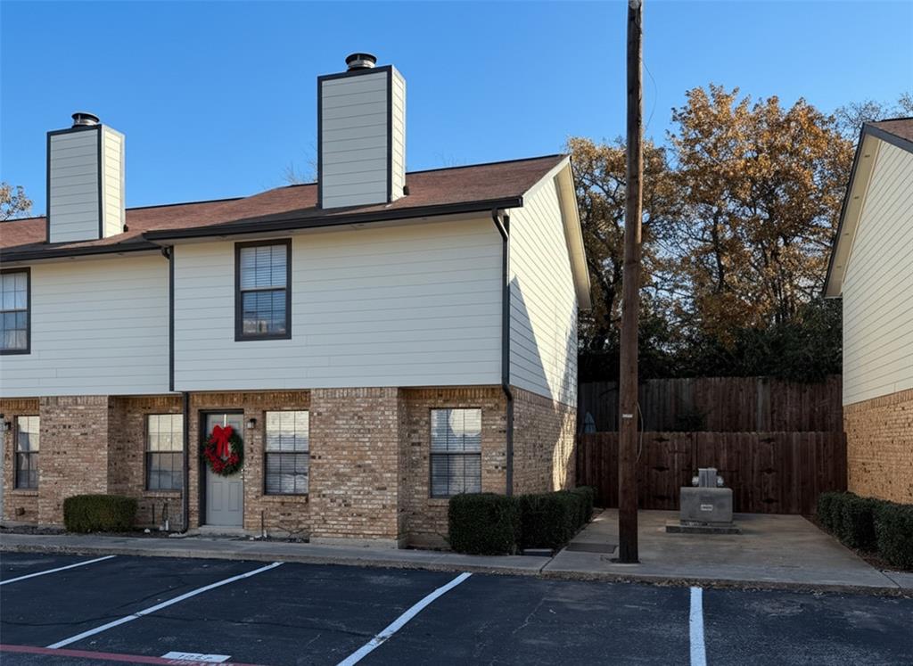1237 Dallas Drive Denton, TX 76205 - Photo 15 of 18 a front view of a house with basket ball court