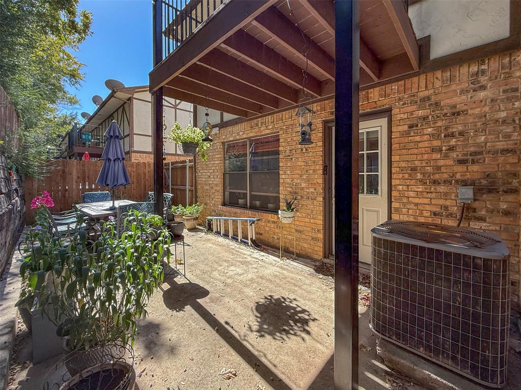 1237 Dallas Drive Denton, TX 76205 - Photo 17 of 18 a view of a backyard with garden