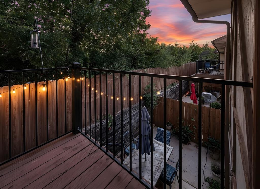 1237 Dallas Drive Denton, TX 76205 - Photo 18 of 18 a view of balcony with wooden floor and fence