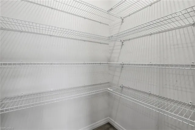 a view of a room with racks on the wall