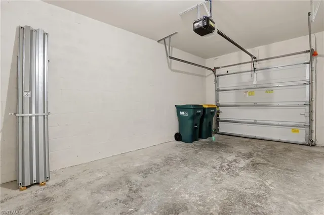 a view of a bedroom with wooden floor and city view