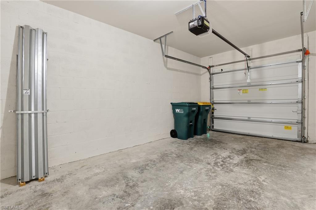 15368 Wildflower Circle Naples, FL 34119 - Photo 25 of 35 a view of a room with shelf