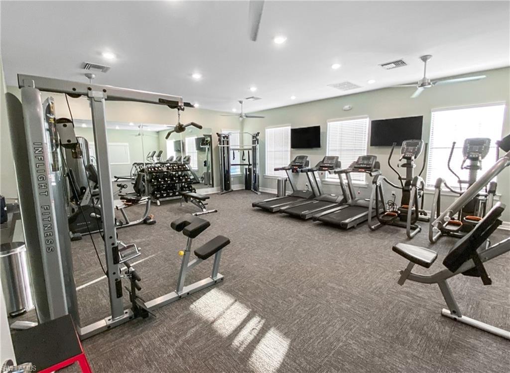 15368 Wildflower Circle Naples, FL 34119 - Photo 34 of 35 a view of a room with gym equipment