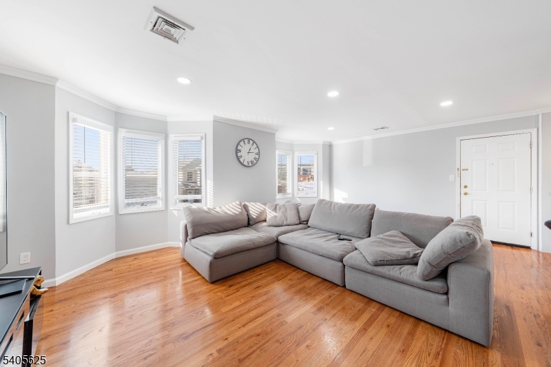 118 Race Street, Unit 2 Elizabeth, NJ 07202 - Photo 16 of 16 a living room with furniture and a large window