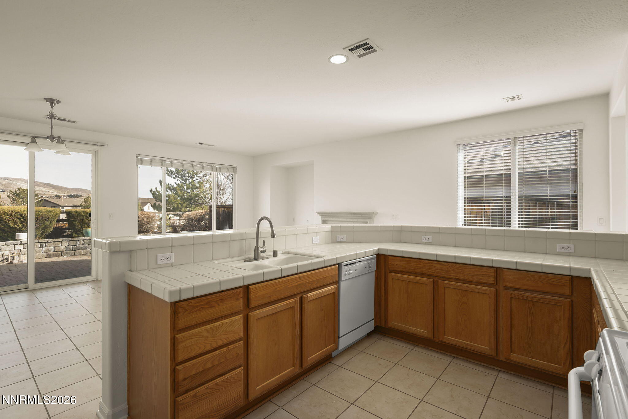 1710 Autumn Valley Way Reno, NV 89523 - Photo 11 of 25 a kitchen with a sink and cabinets