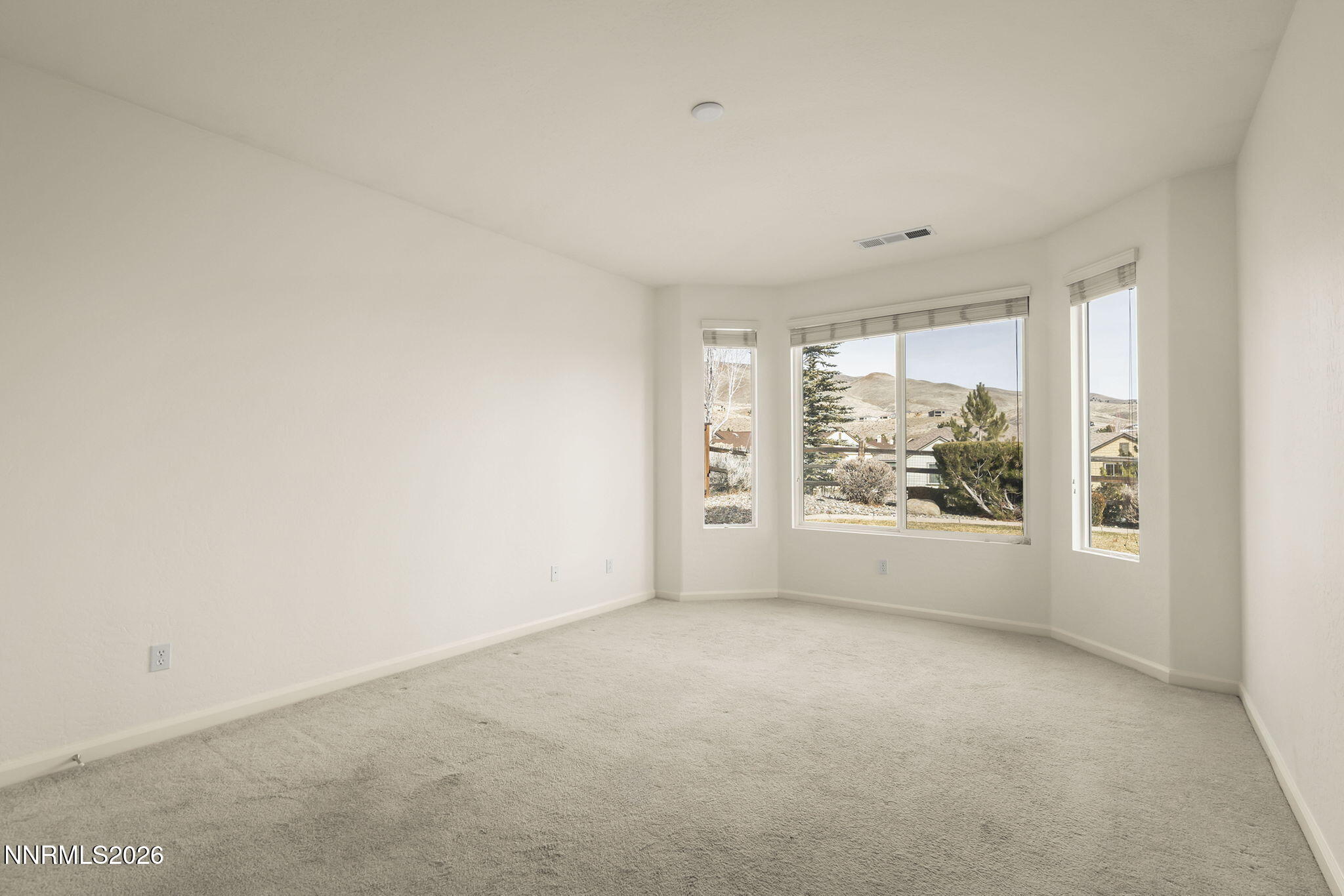 1710 Autumn Valley Way Reno, NV 89523 - Photo 15 of 25 an empty room with windows