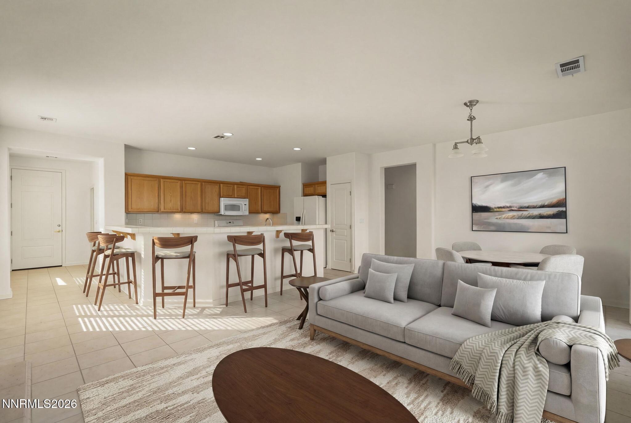 1710 Autumn Valley Way Reno, NV 89523 - Photo 8 of 25 a living room with furniture and a wooden floor