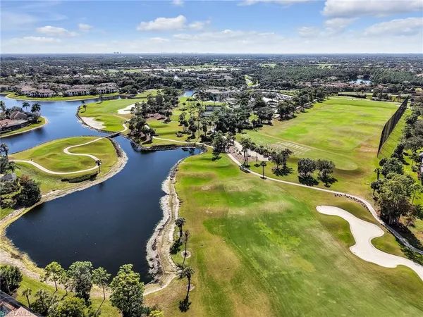 a view of a lake with a building in the background