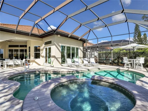 a view of a swimming pool with a patio